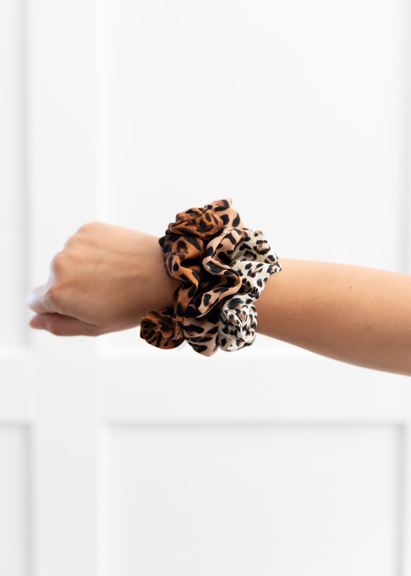 brown, tan and cream leopard pattern scrunchies!