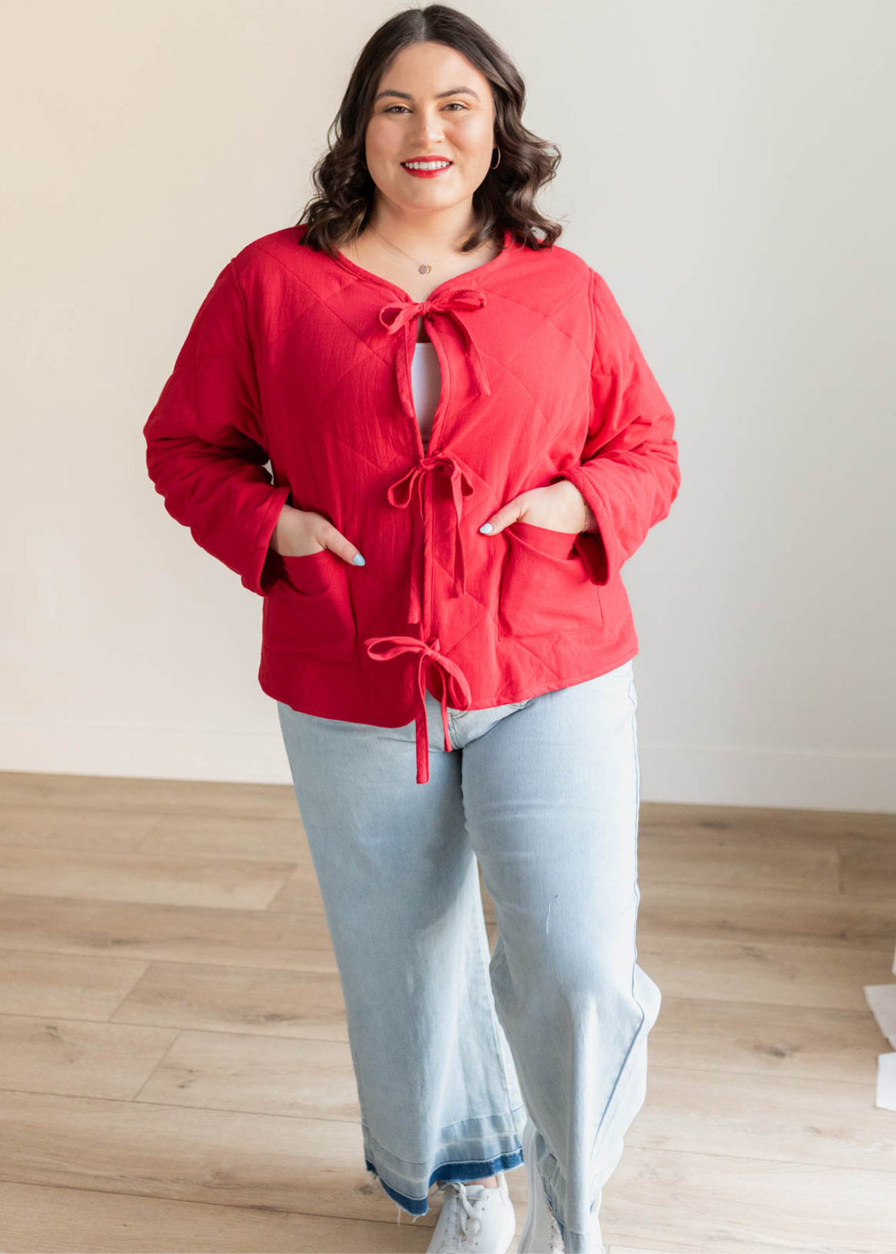 Plus size red quilted tie jacket with long sleeves