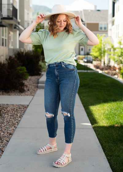 Sage top with short sleeves that have cuffs