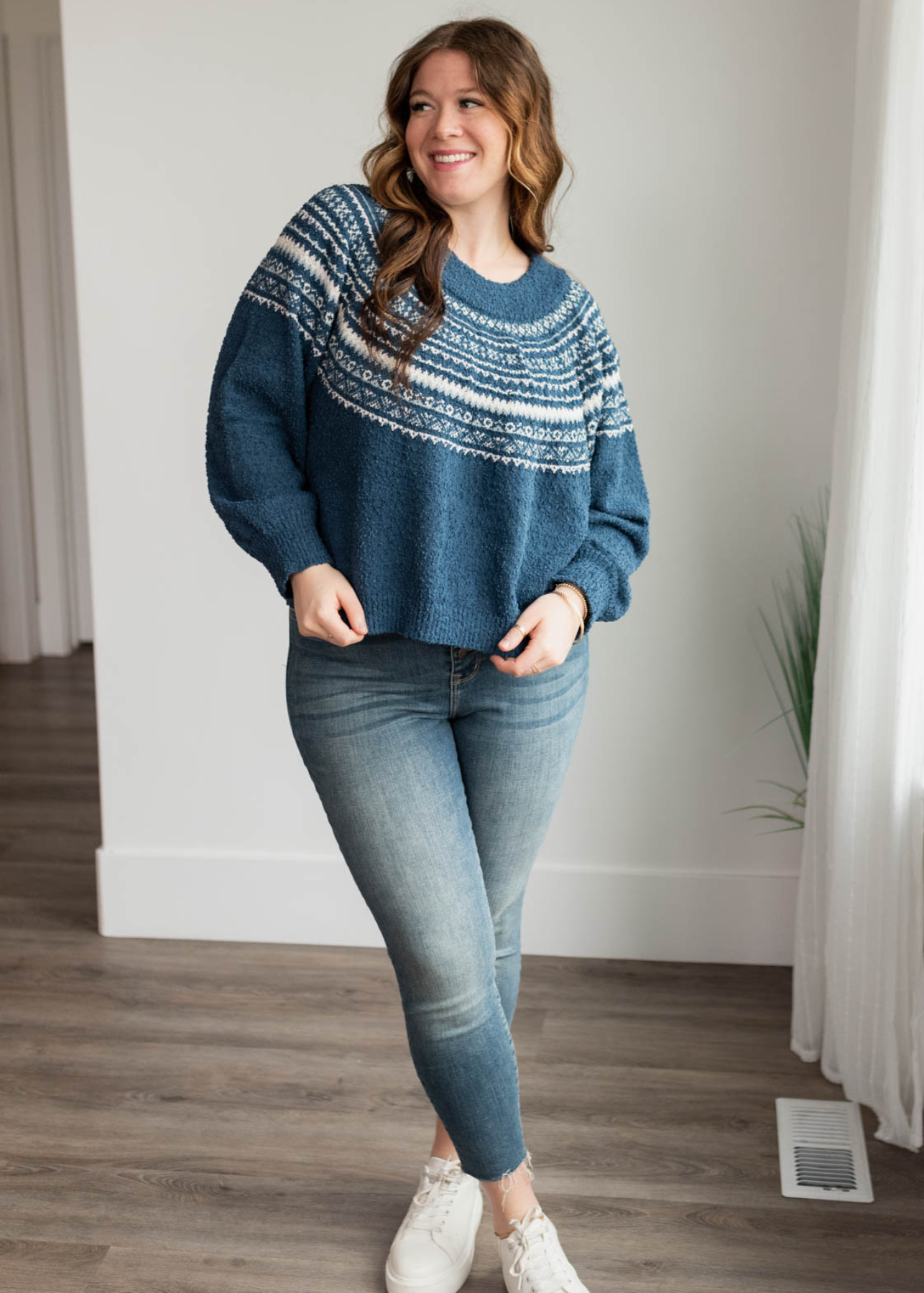 Plus size navy knit sweater with long sleeves and ivory pattern