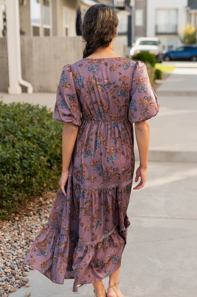 Back view of the plum floral tiered dress