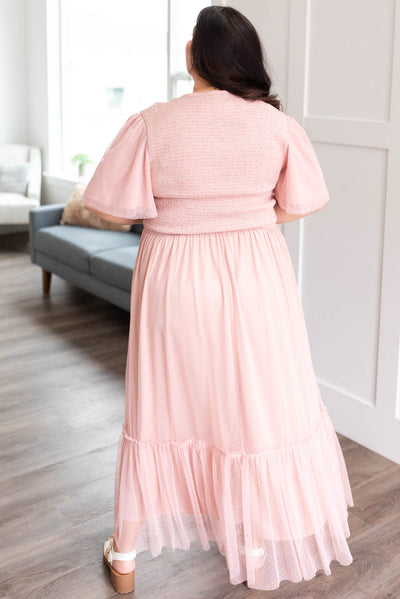 Back view of the blush smoked mesh dress