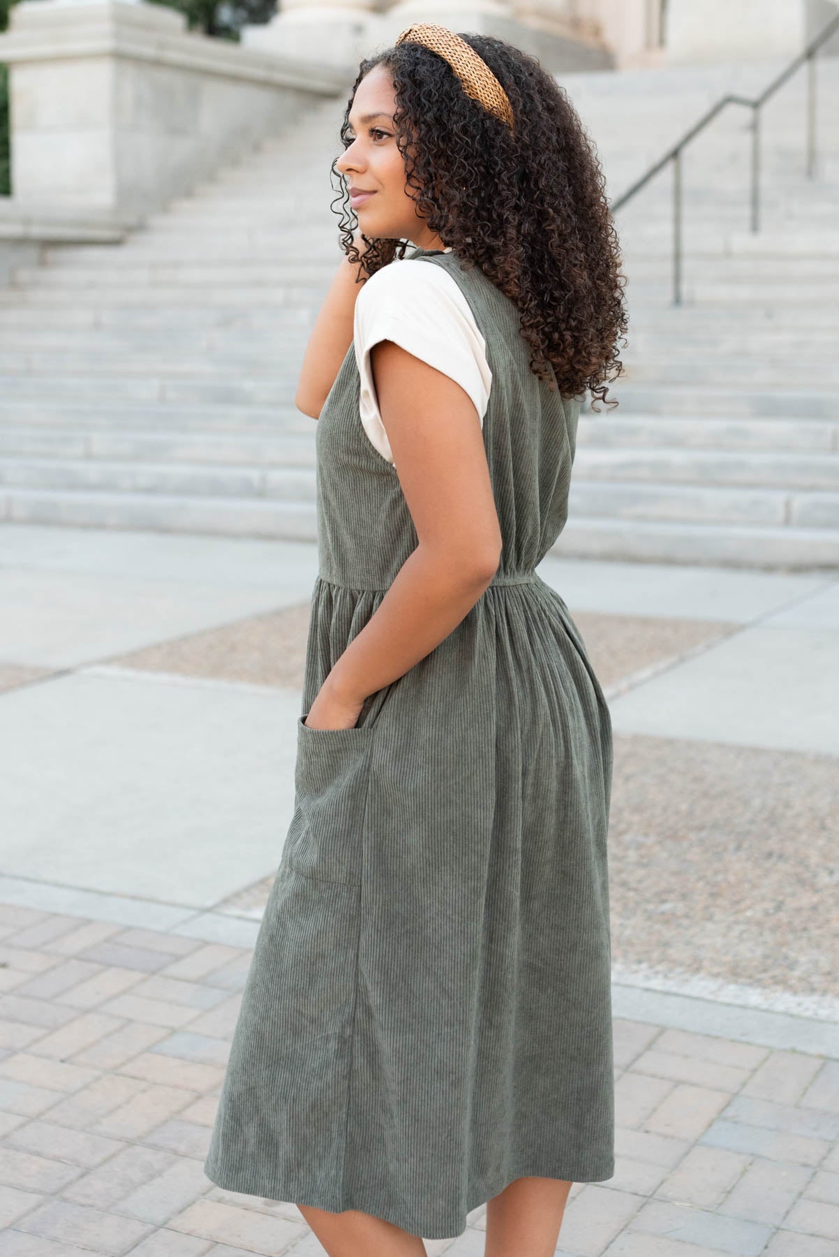 Side view of the olive corduroy dress