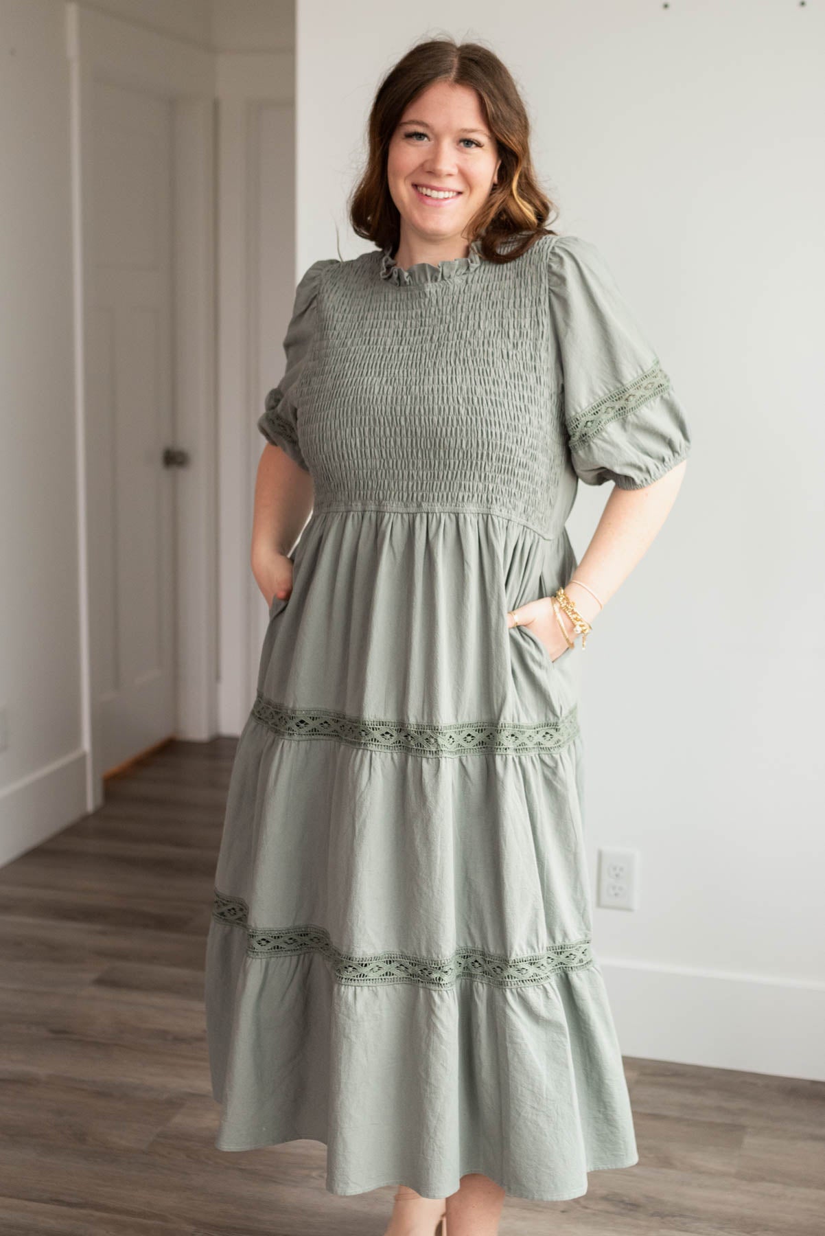 Plus size dark sage tiered dress with short sleeves