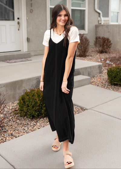 V-neck black overall dress with front seam