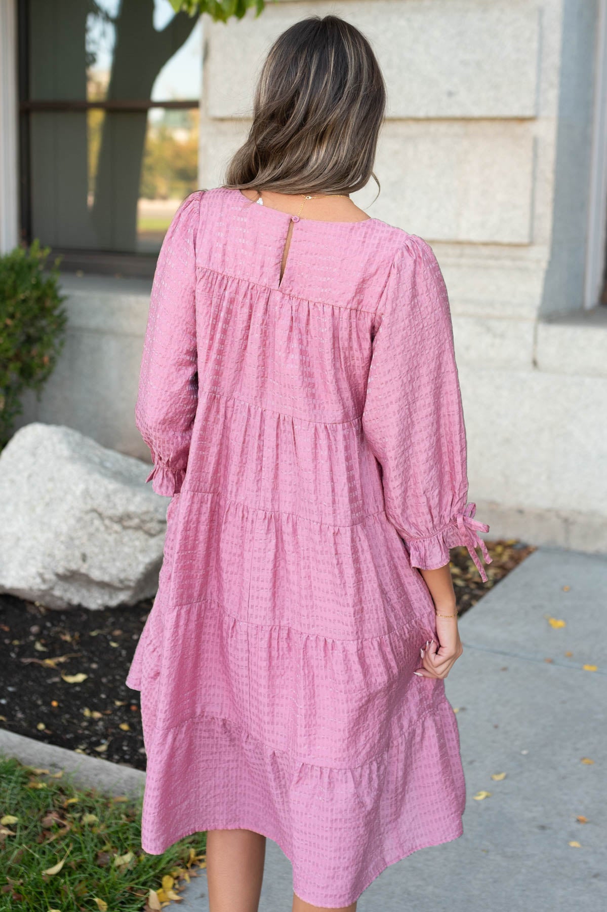 Back view of the pink long sleeve dress