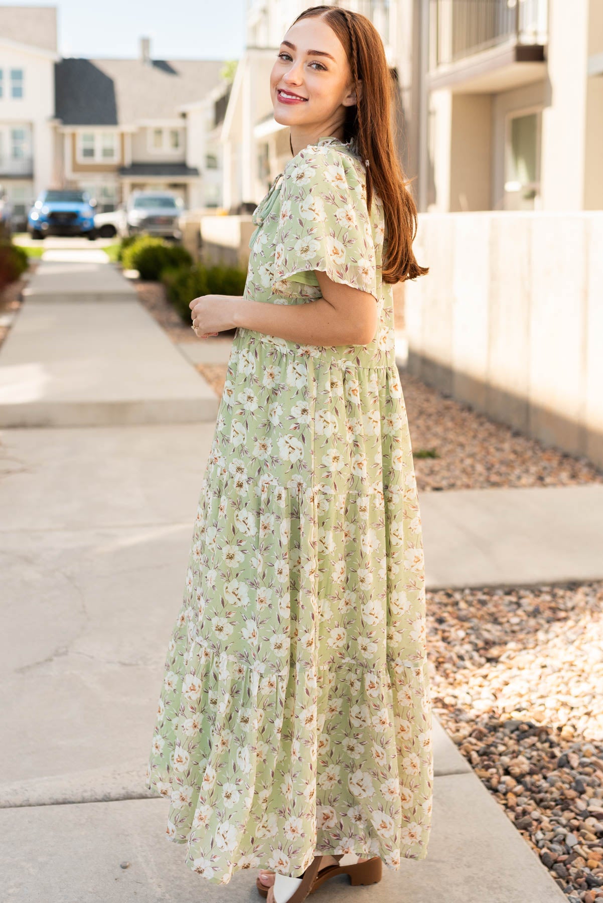 Side view of the sage floral dress