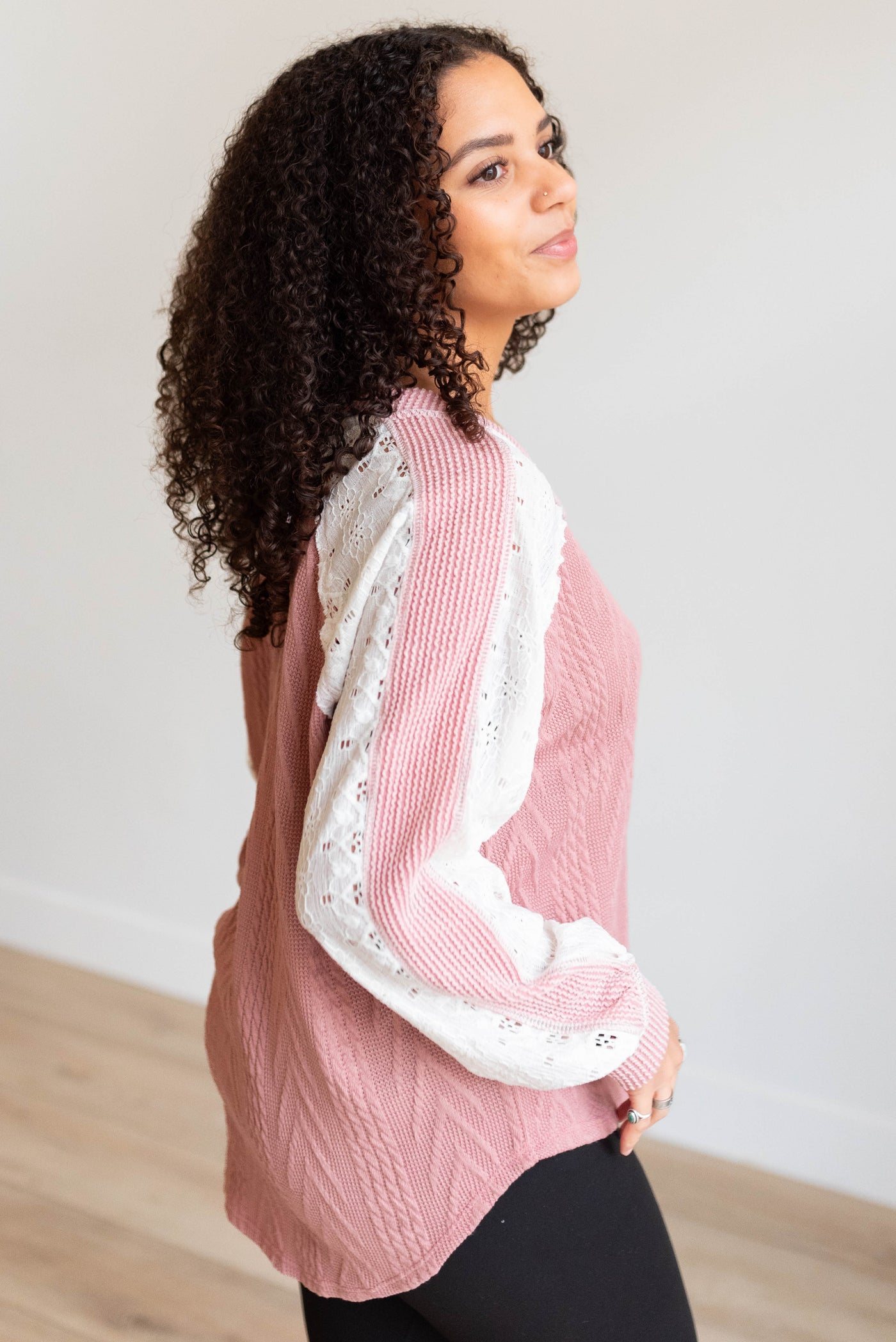 Side view of the mauve lace sleeve pullover