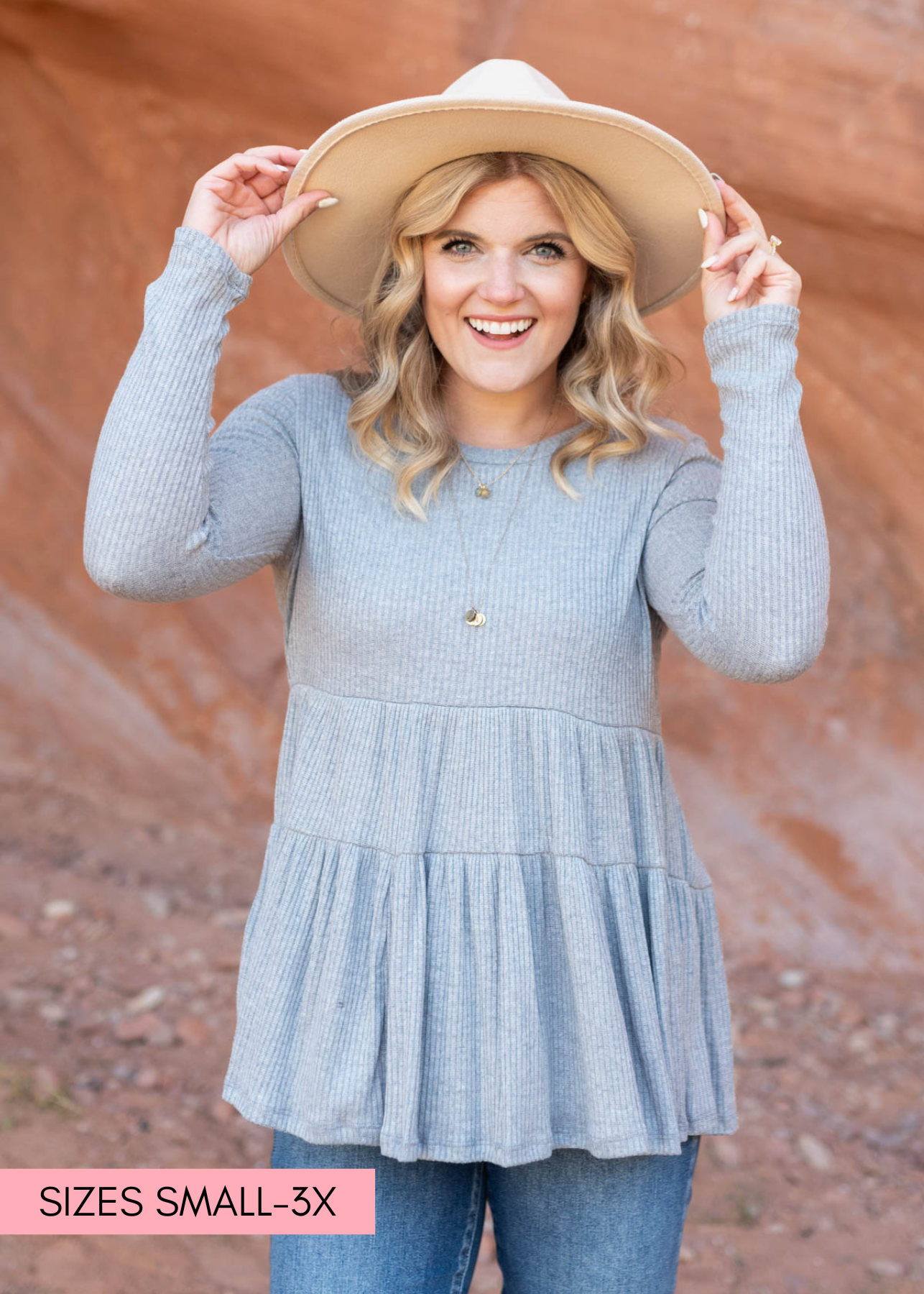 Heather grey top with tiered peplum style