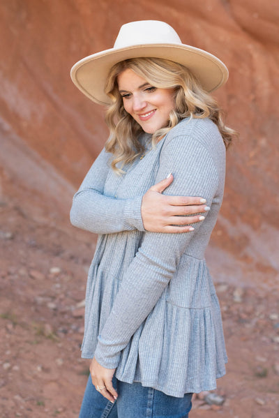 Side view of heather grey top