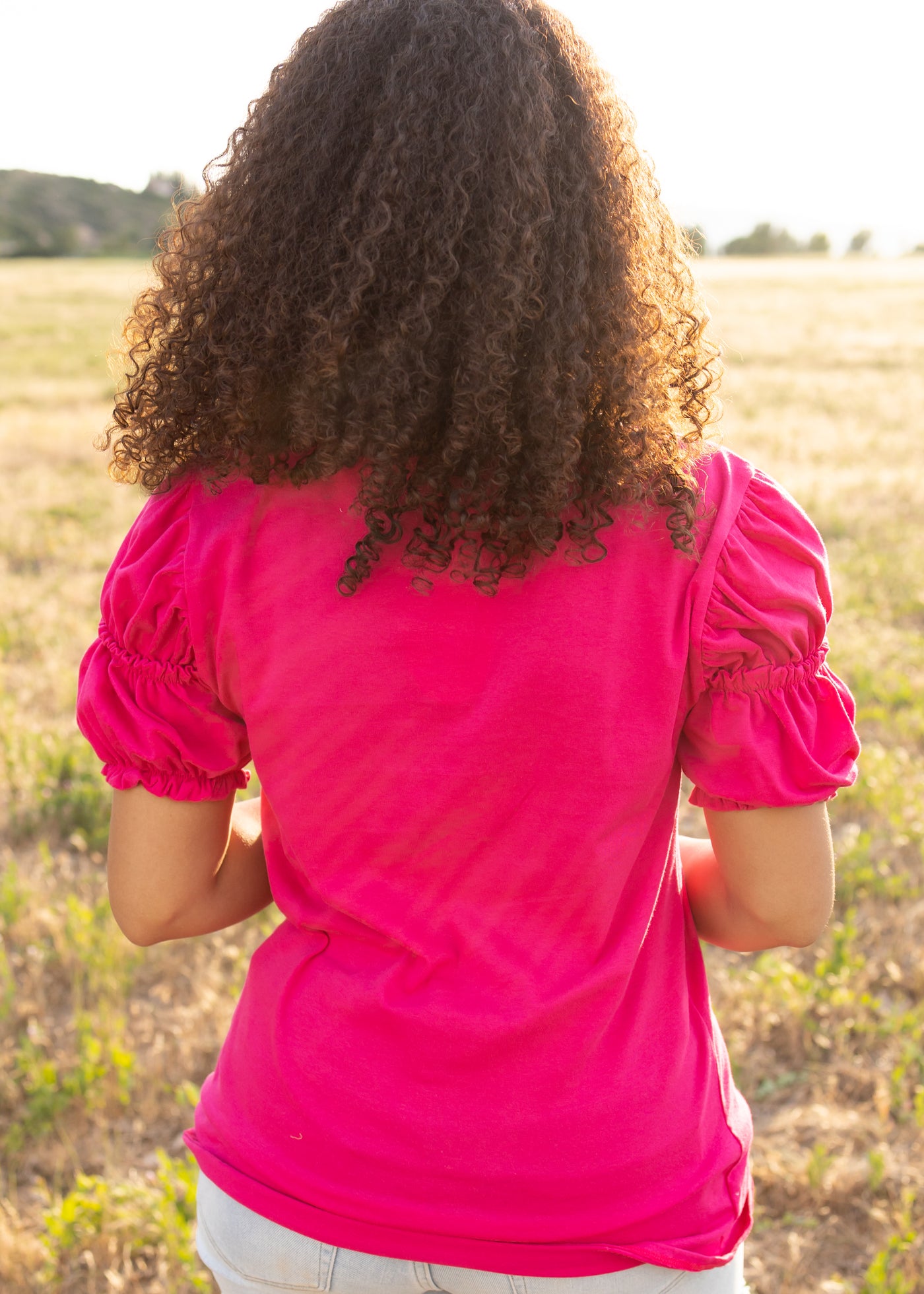 Back view of a dark fuchsia top