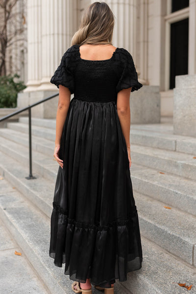 Back view of a black organza dress