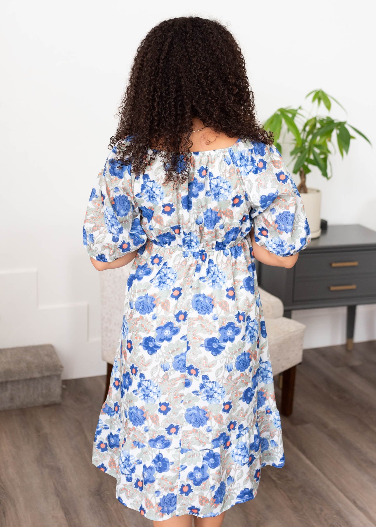 Back view of the blue floral dress