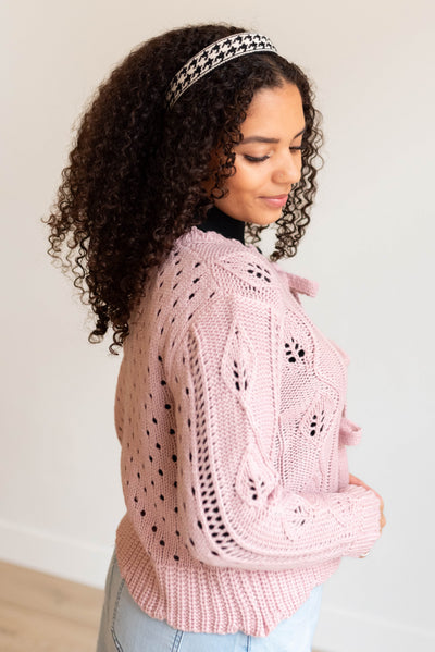 Side view of the pink open tie cardigan