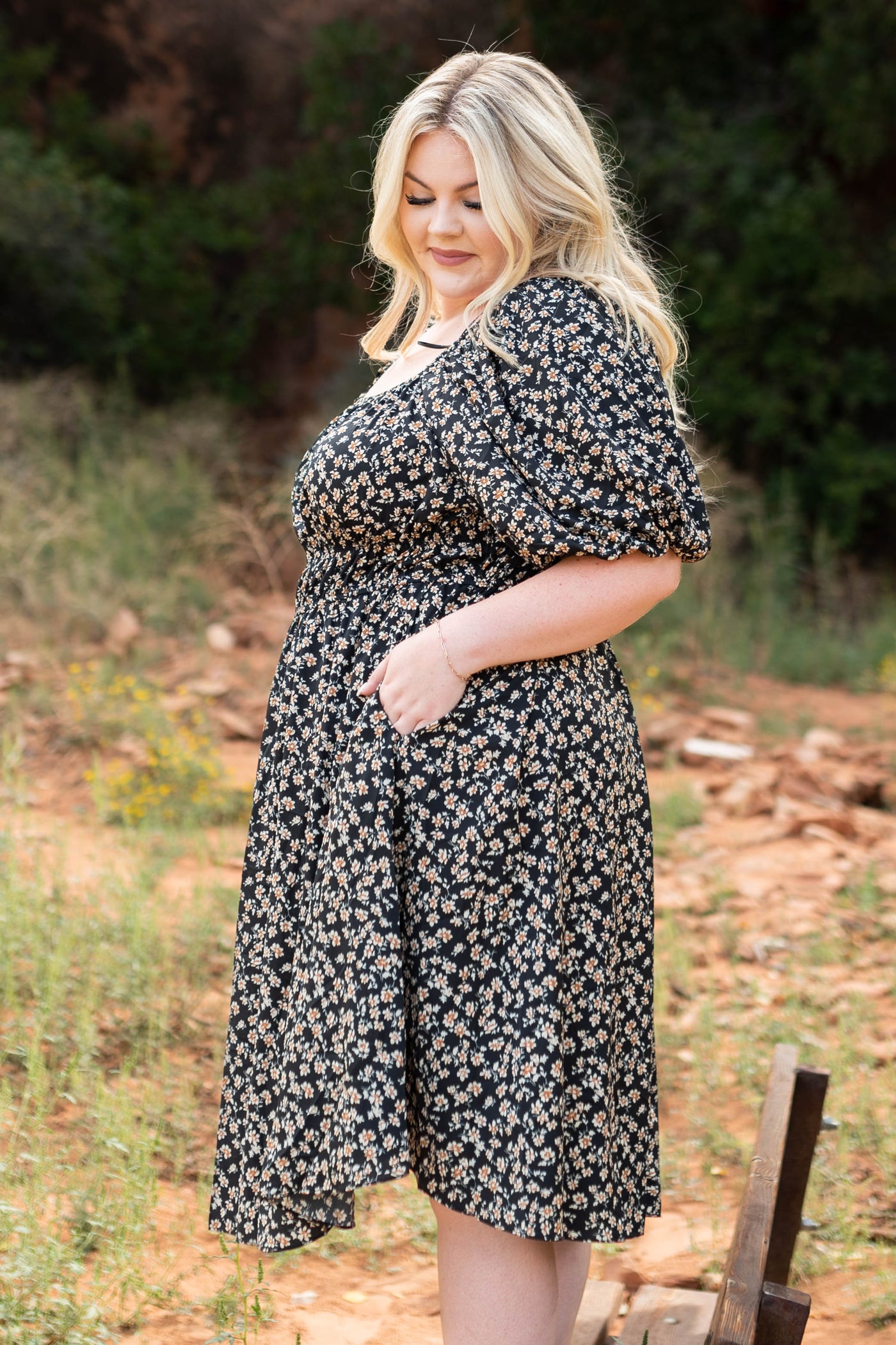 Side view of a black floral dress