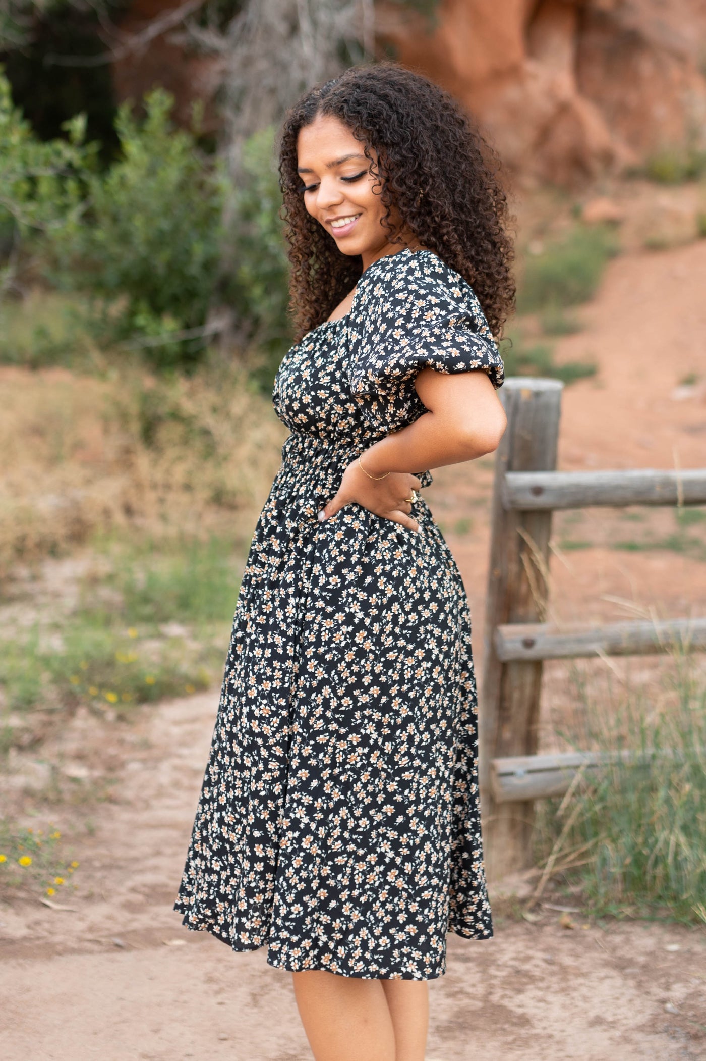 Side view of the black floral dress