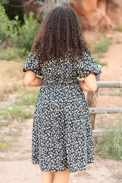 Back view of the black floral dress