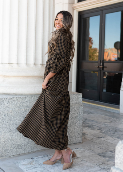 Side view of the brown gingham tiered dress