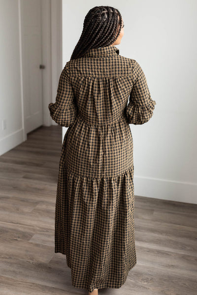 Back view of the brown gingham tiered dress