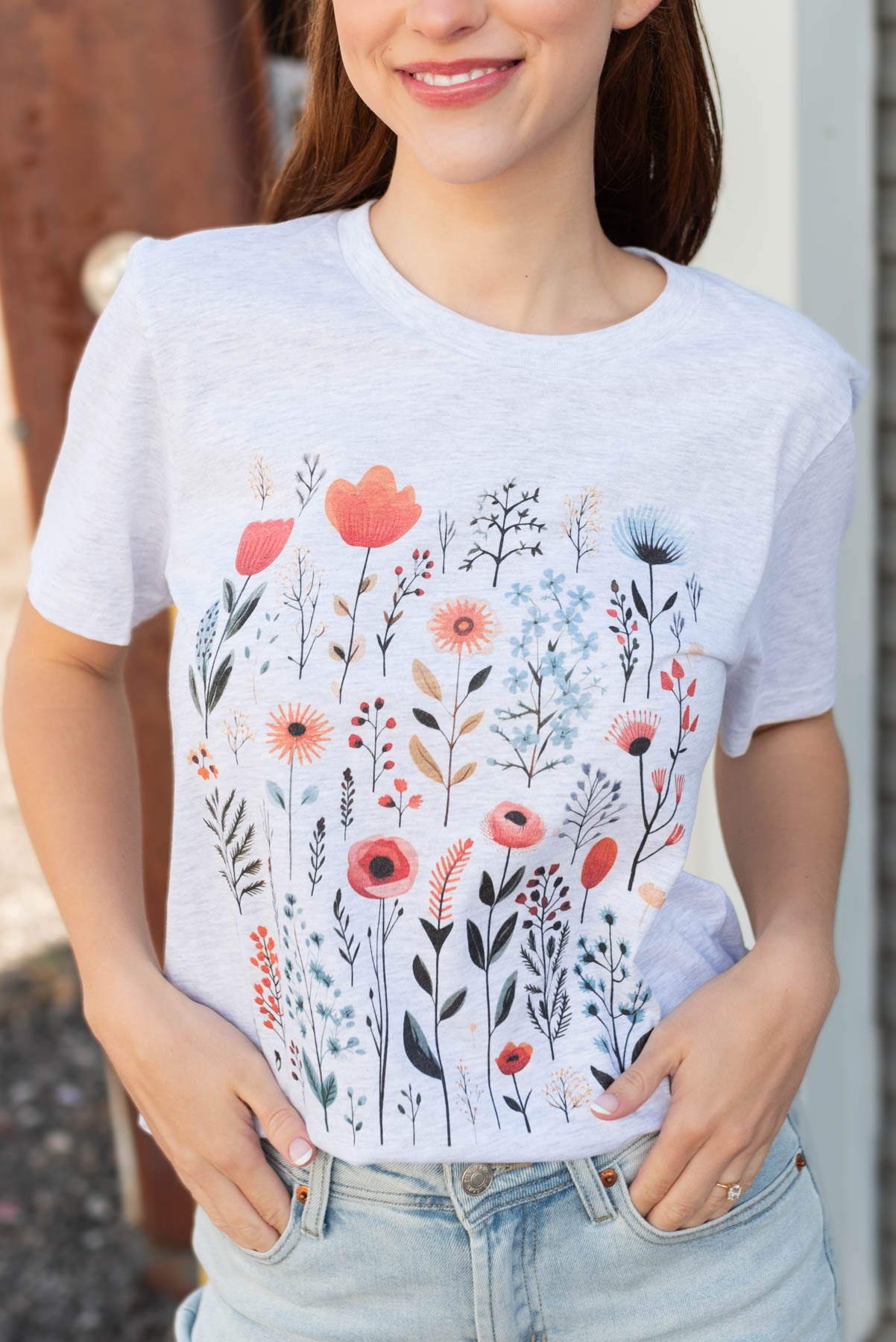 Close up of the multi color wildflower tee