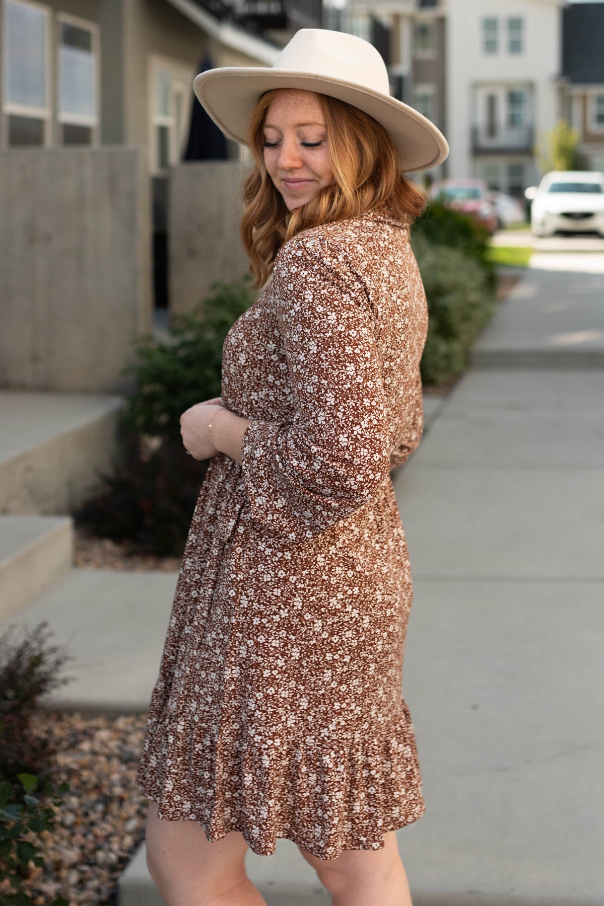 Side view of a brown floral dress