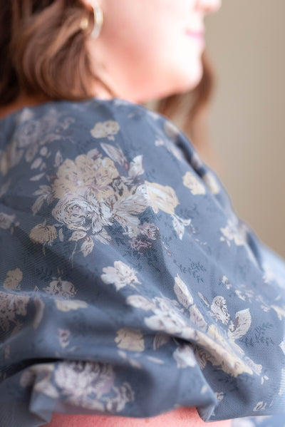 Close up of the fabric on the navy multi floral dress