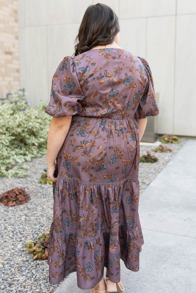 Back view of the plus size plum floral tiered dress