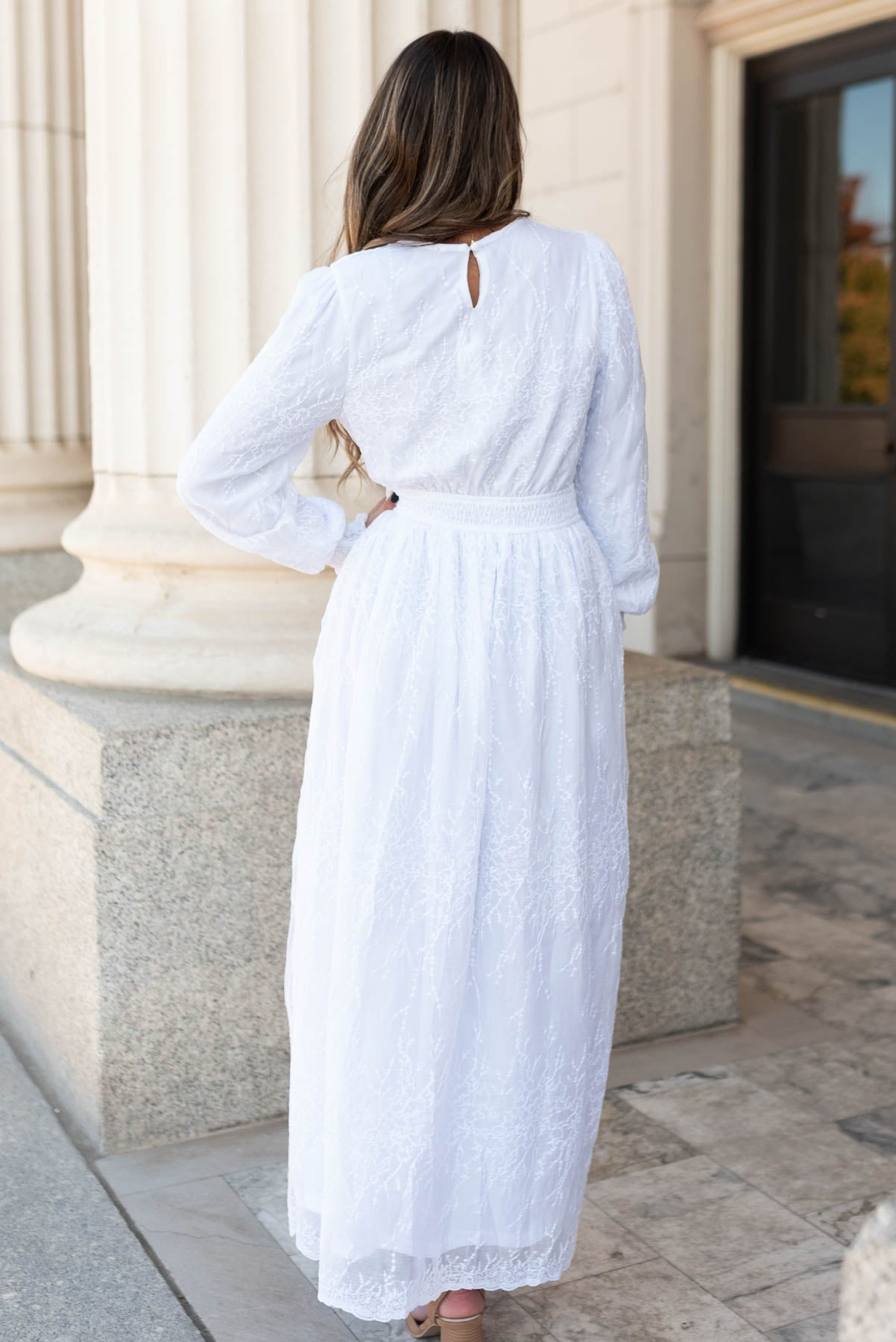 Back view of the white embroidered maxi dress