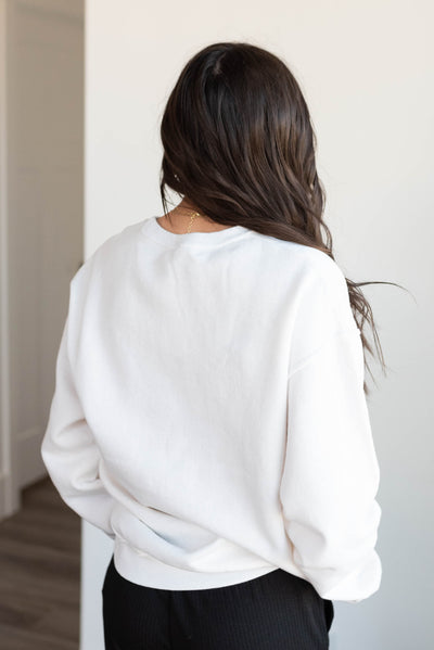 Back view of the white Banff National Park sweatshirt