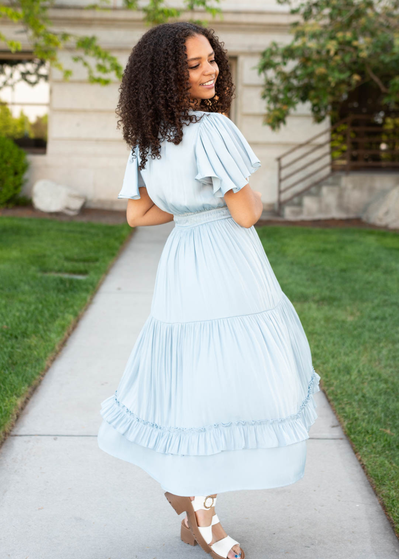 Side view of the light blue satin dress