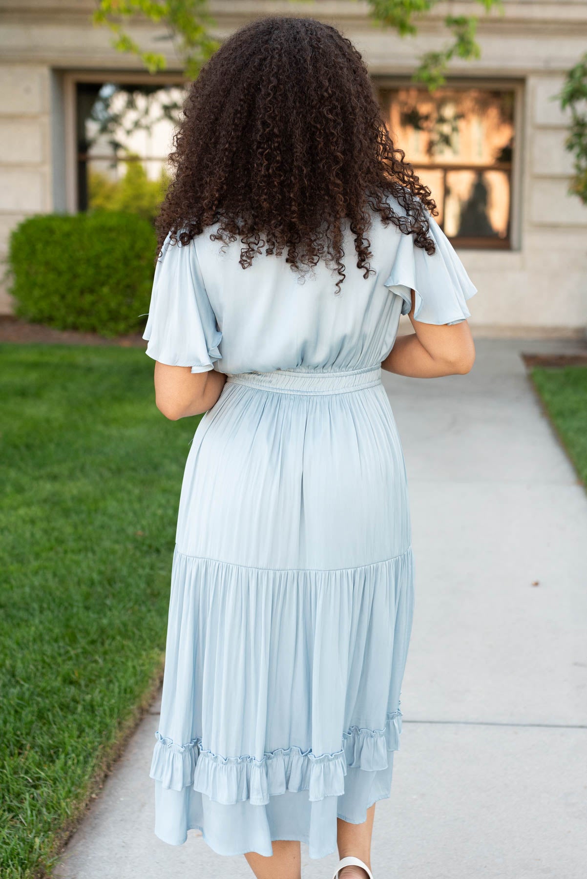 Back view of the light blue satin dress