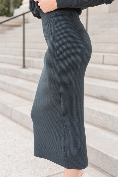 Side view of the midnight navy skirt