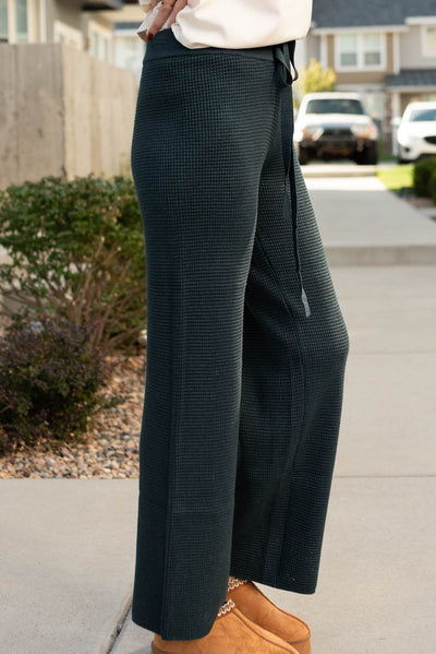 Side view of the navy pants