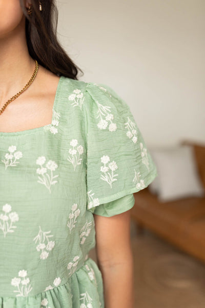 Close up of the sleeves on the sage floral blouse