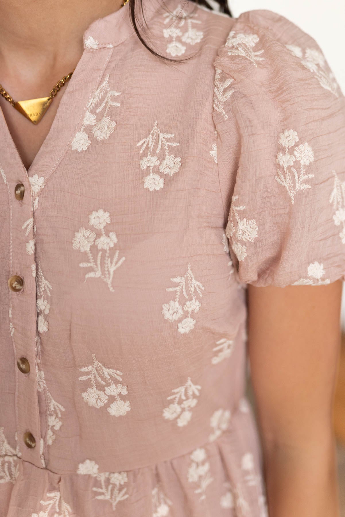 Close up of the floral pattern on the plus size dusty pink floral dress