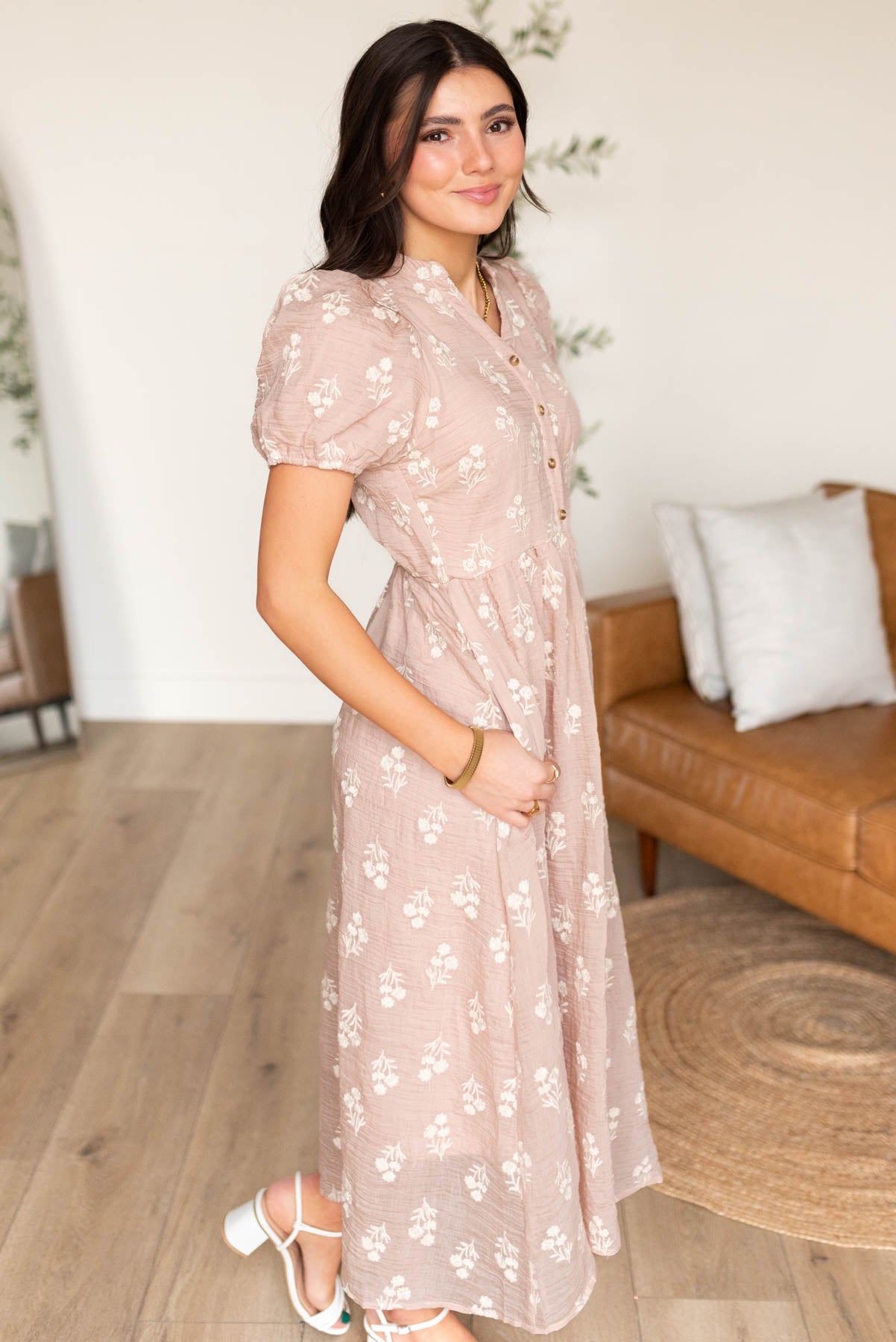 Side view of the dusty pink floral dress with pockets