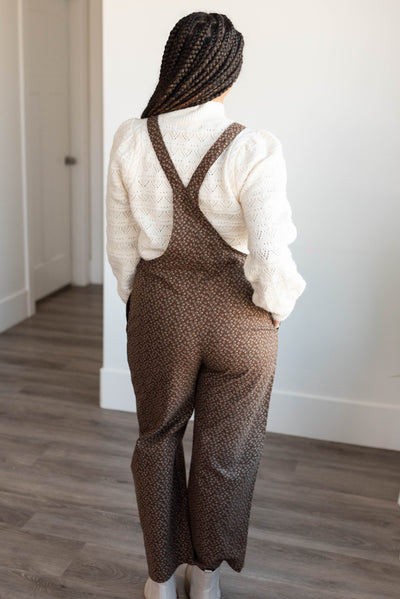 Back view of the the brown printed overalls