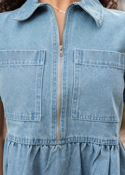 Close up of the bodice on the denim zip up dress