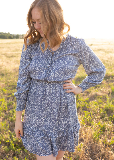 Long sleeve blue leopard dress with button up bodice