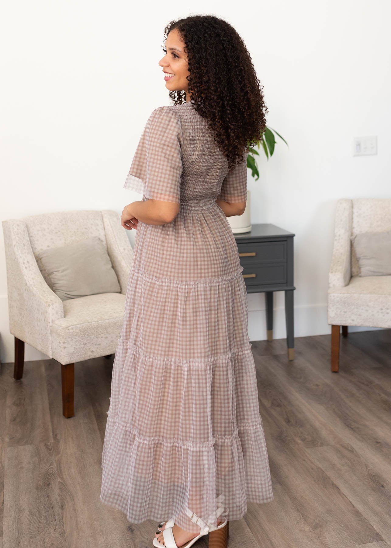 Side view of the light mocha gingham dress