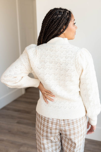 Back view of the cream puff sweater