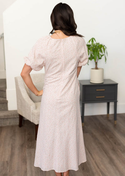 Back view of the blush floral dress