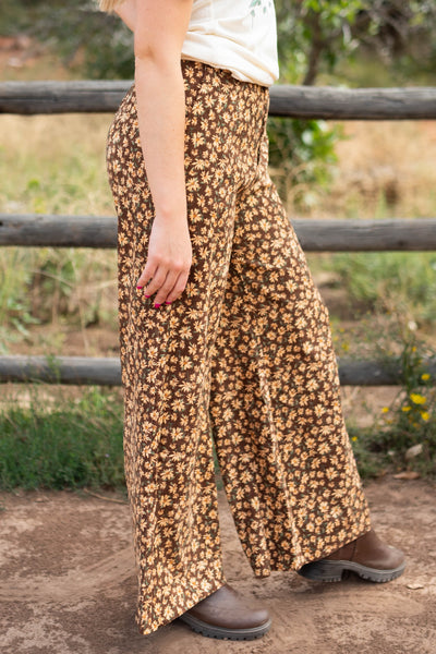 Side view of brown floral pants