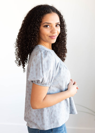 Side view of the blue rose floral blouse