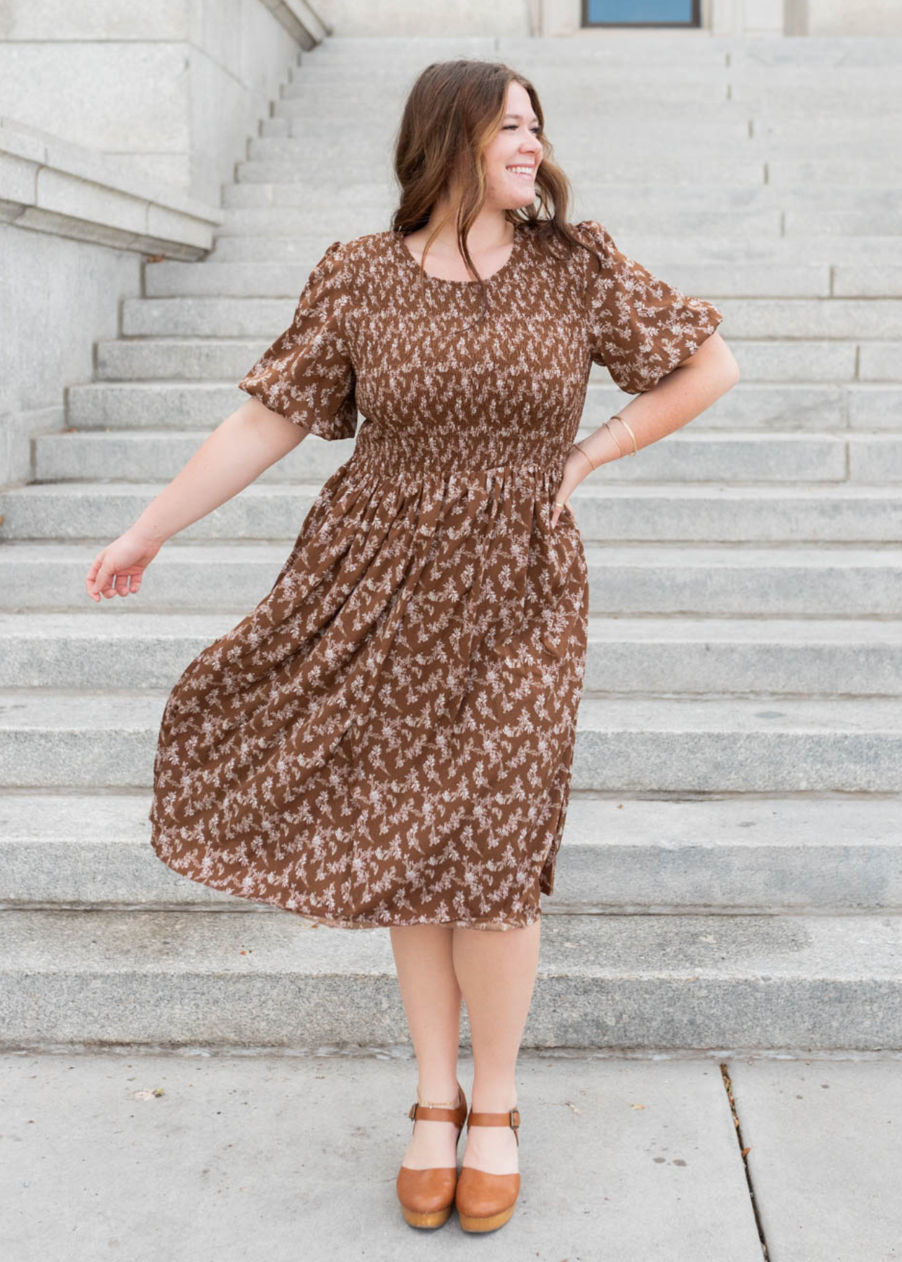 Plus size brown floral smocked dress with a smocked bodice