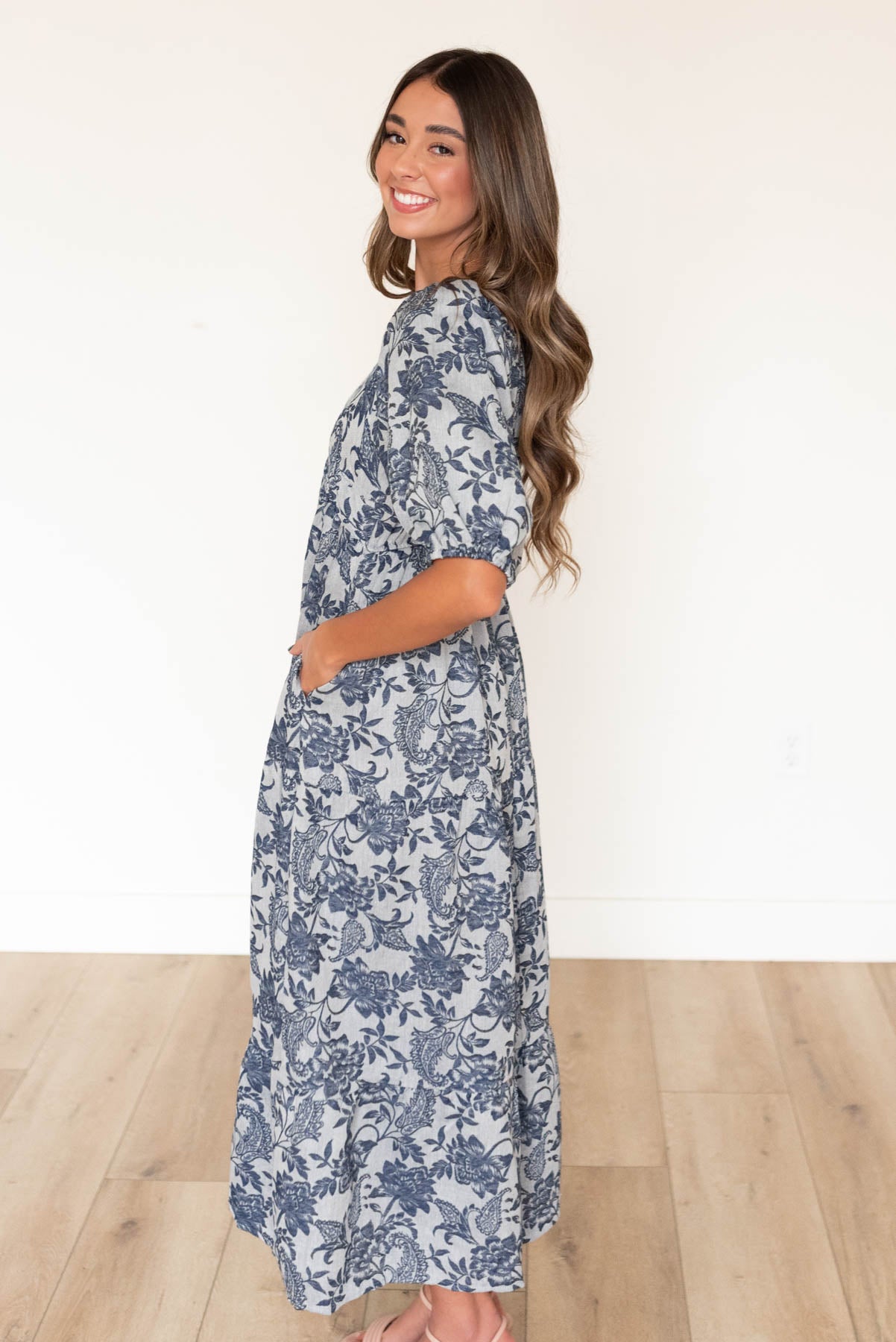 Side view of the navy floral dress