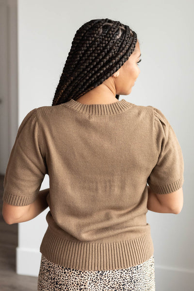 Back view of the taupe short sleeve sweater