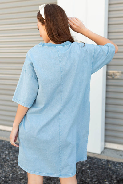 Back view of the blue smiley midi dress