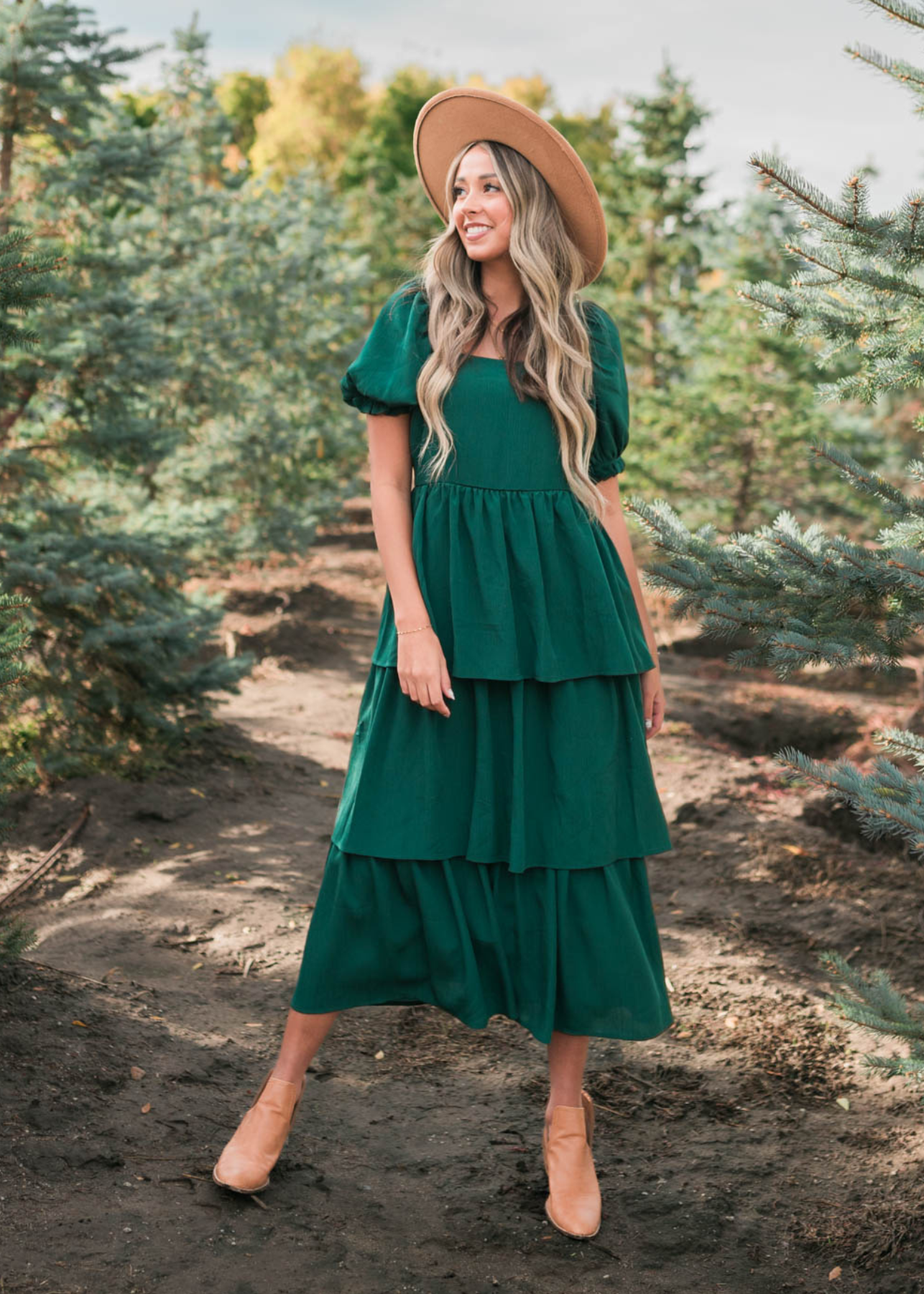 Green ruffle tiered dress with short sleeves and a square neck