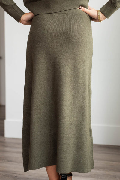 Back view of the dark olive knit skirt